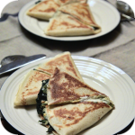 Pancakes stuffed with spinach and feta cheese