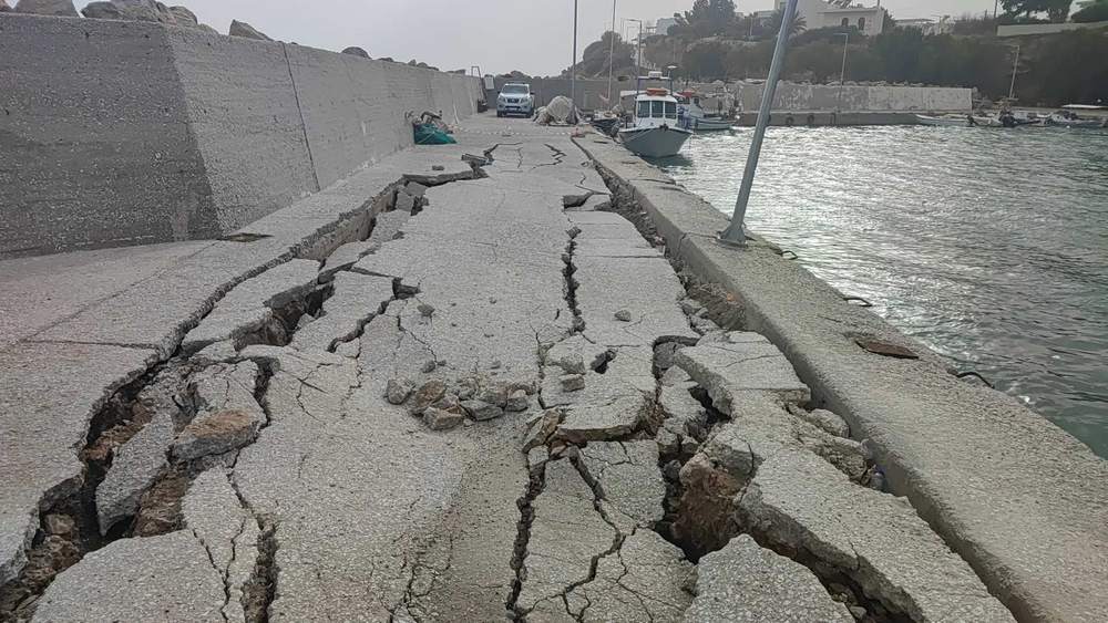 Damaged port in Makry Gialos