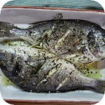 Dorada from the oven with lemon and rosemary