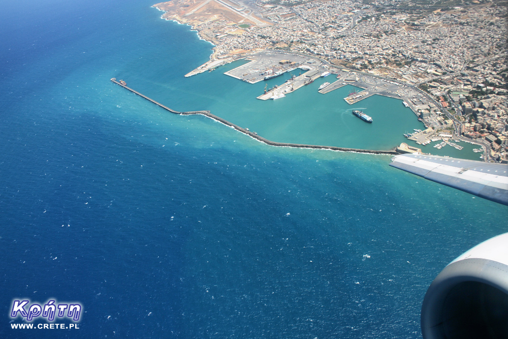 The photo shows a view from a plane taking off from Heraklion airport.